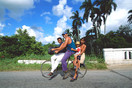 Cuba Camaguey Prov. Family on bike.