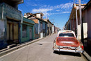 Cuba Santiago de Cuba 'street view with an old American car'
