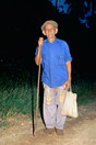 Cuba Holguin Prov. Man with stick and bag.