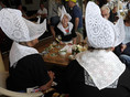 Volendam 2018  'Women in traditional costumes in a restaurant at the Dijk'