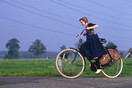 Staphorst 1988  'Beertje in traditional costume with a traditional bike'