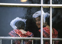 Netherlands Staphorst 1986 'young women behind church window'
