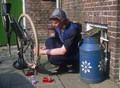 Staphorst in the 80's ' young woman decorates her bicycle'